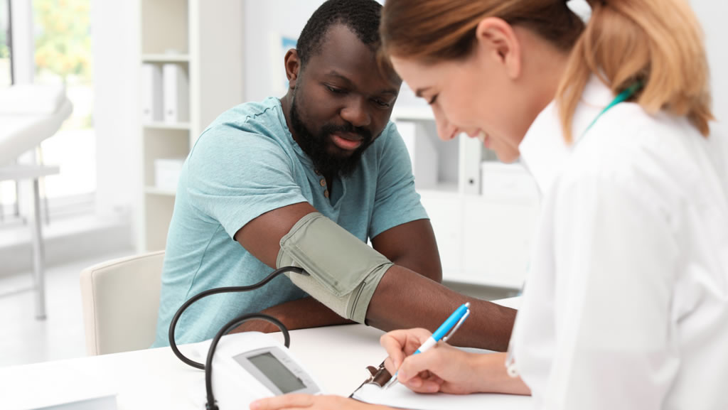 man taking a blood pressure test